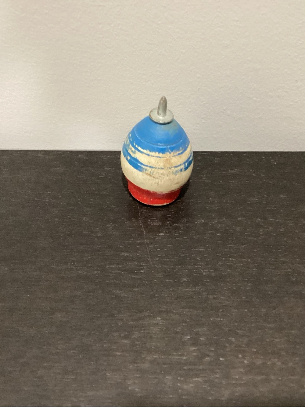 Vintage Wooden Spinning top Classic Children’s Toy.  Red, white and Blue color’s